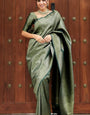 Scrupulous Dark Green Soft Silk Saree With Glowing Blouse Piece