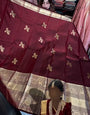 Ethnic Wine Soft Banarasi Silk Saree With Evanescent Blouse Piece