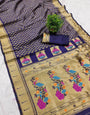 Cynosure Navy Blue Paithani Silk Saree With Mesmerising Blouse Piece