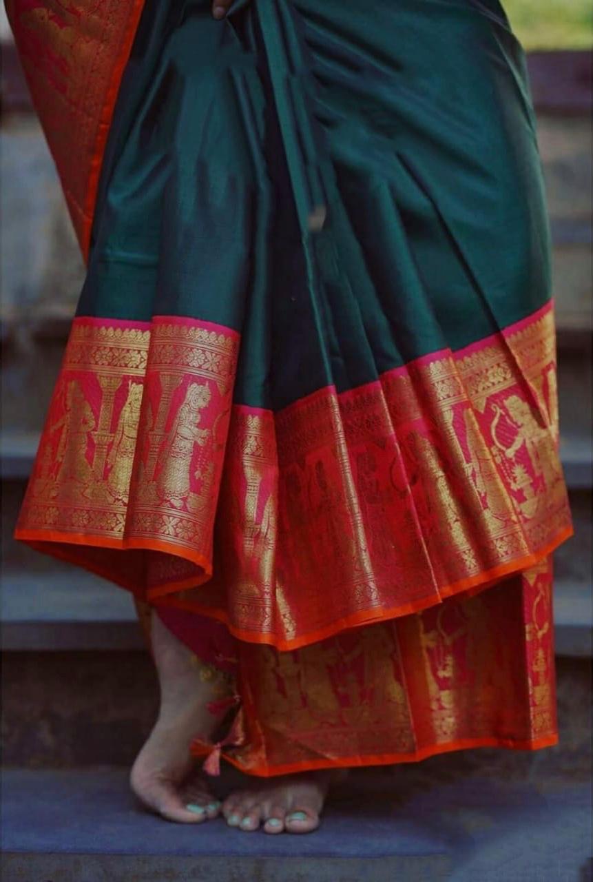 Entrancing Green Soft Silk Saree With Embrocation Blouse Piece