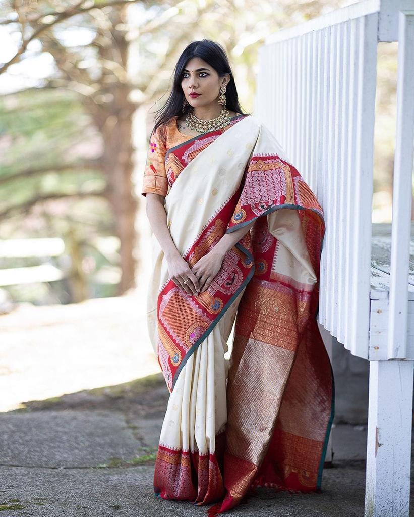 Attractive Off White Soft Banarasi Silk Saree With Bewitching Blouse Piece