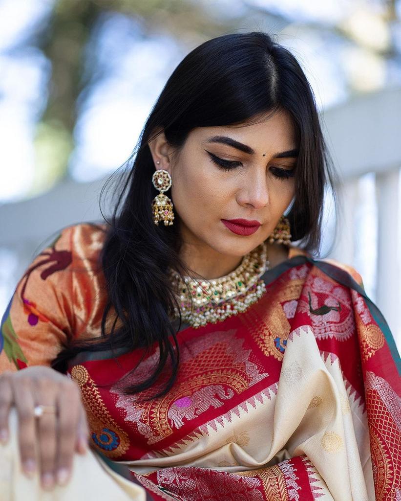 Attractive Off White Soft Banarasi Silk Saree With Bewitching Blouse Piece