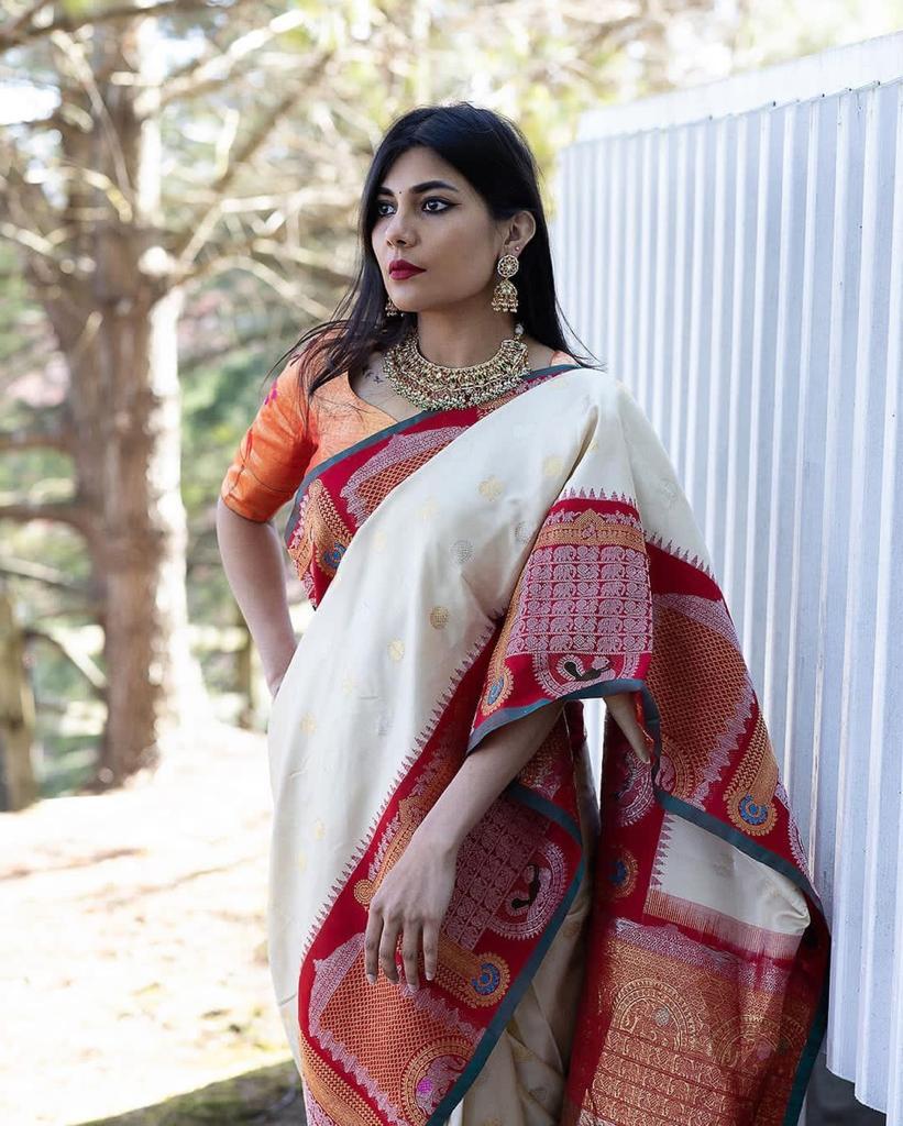 Attractive Off White Soft Banarasi Silk Saree With Bewitching Blouse Piece