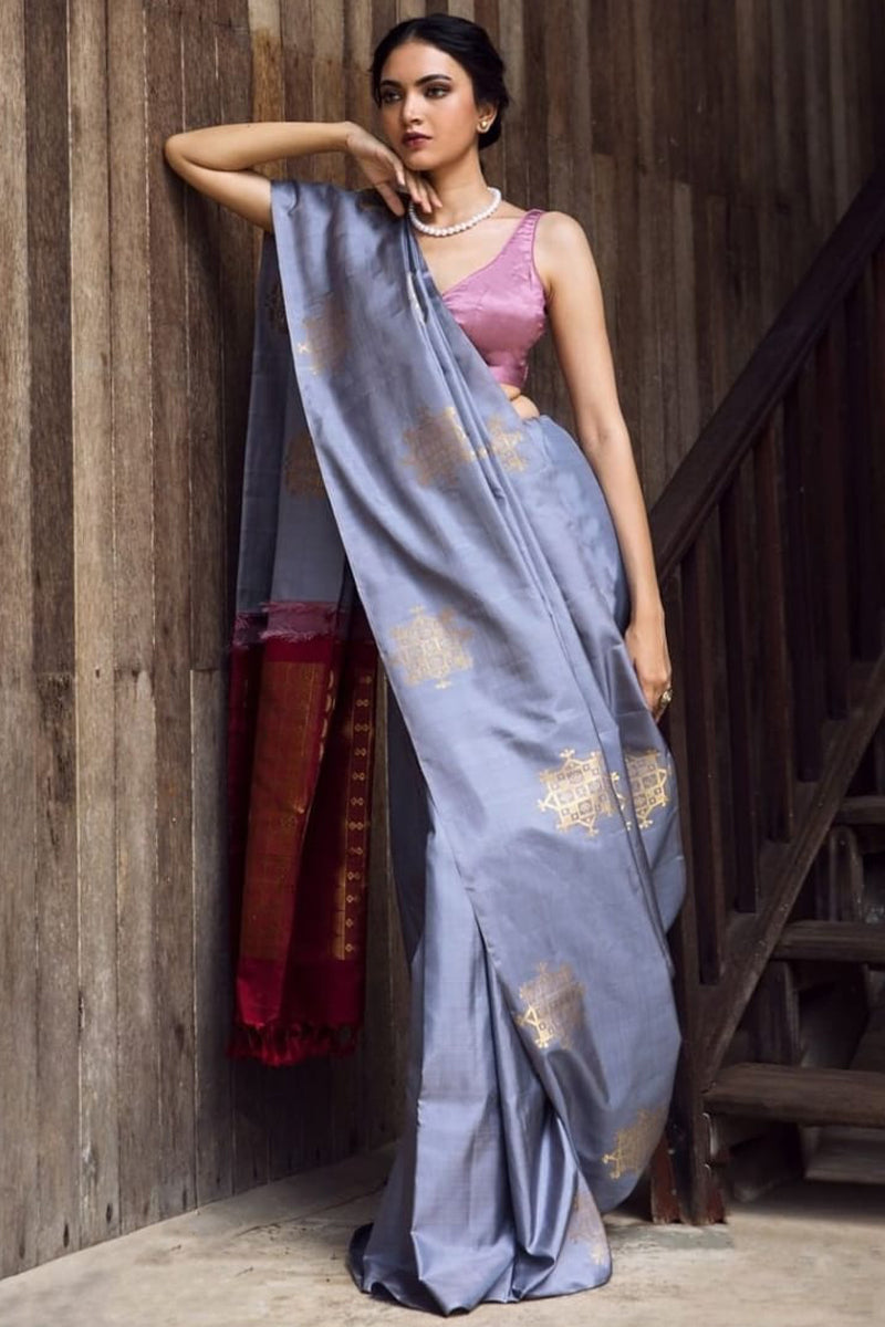 Ephemeral Grey Soft Silk Saree With Charismatic Blouse Piece