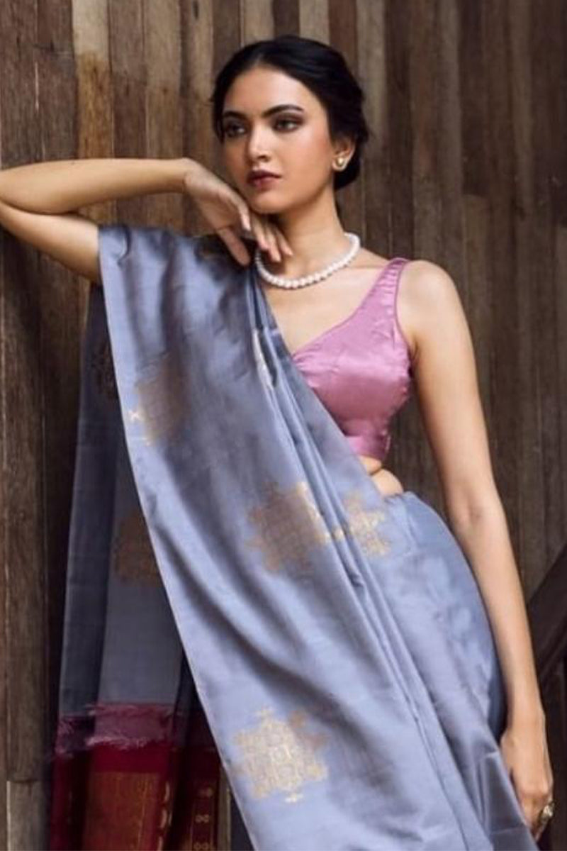 Ephemeral Grey Soft Silk Saree With Charismatic Blouse Piece