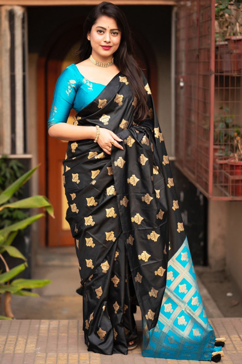 Elaborate Black and Firozi Soft Silk Saree With Piquant Blouse Piece