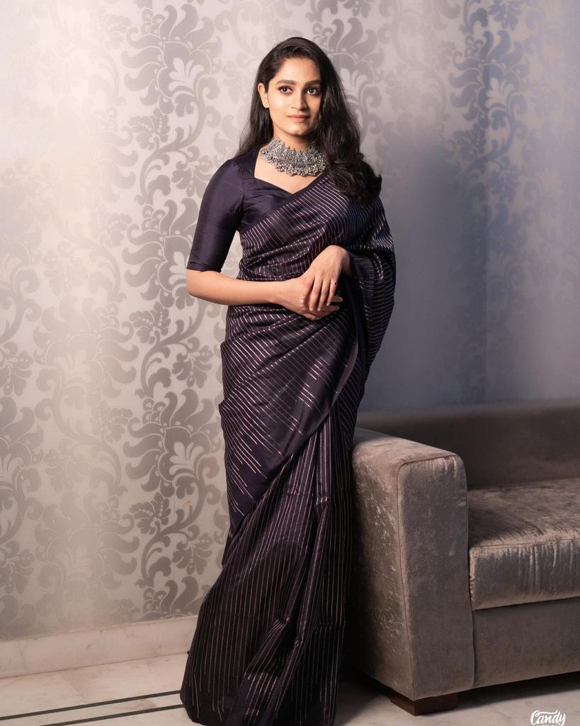 Surpassing Black Soft Silk Saree With Stunning Blouse Piece