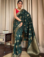 Symmetrical Dark Green Soft Silk Saree With Lustrous Blouse Piece