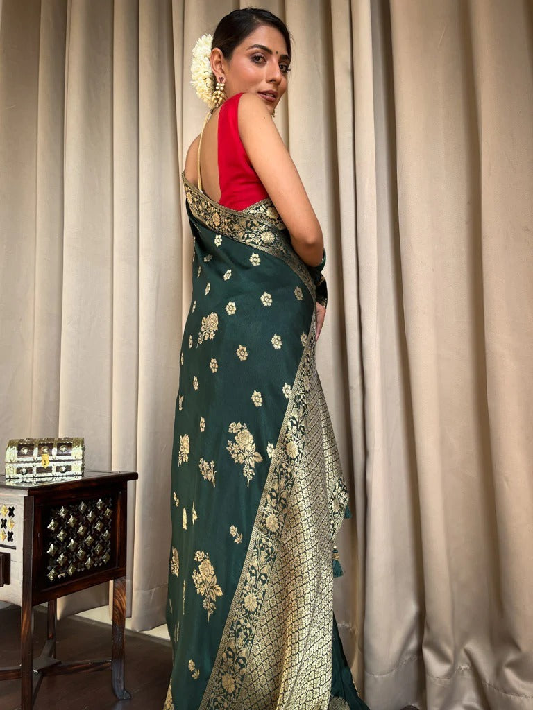 Symmetrical Dark Green Soft Silk Saree With Lustrous Blouse Piece