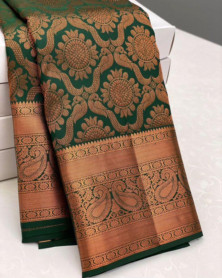 Glowing Dark Green Soft Silk Saree With Demesne Blouse Piece