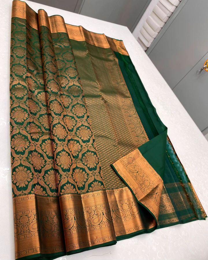 Glowing Dark Green Soft Silk Saree With Demesne Blouse Piece