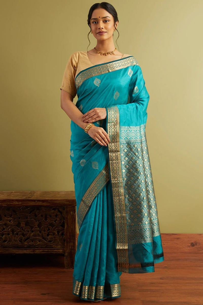 Stunning Firozi Soft Silk Saree With Classy Blouse Piece