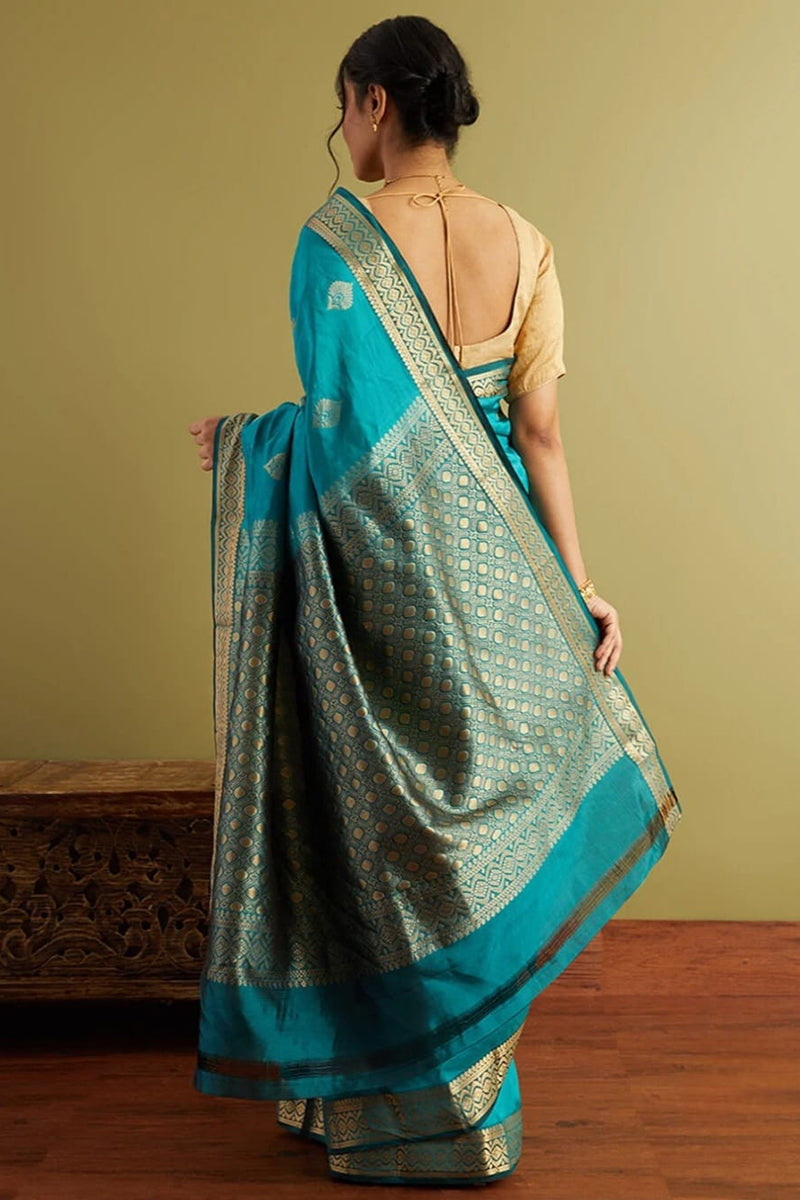 Stunning Firozi Soft Silk Saree With Classy Blouse Piece