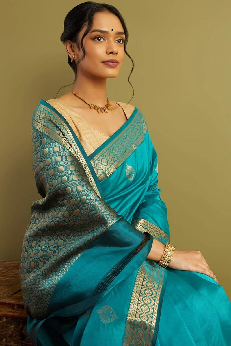 Stunning Firozi Soft Silk Saree With Classy Blouse Piece