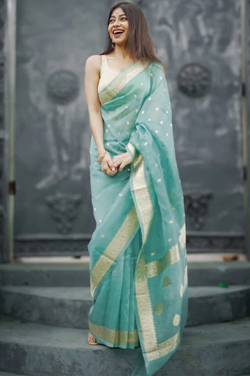 Luminous Turquoise Linen Silk Saree With Ravishing Blouse Piece