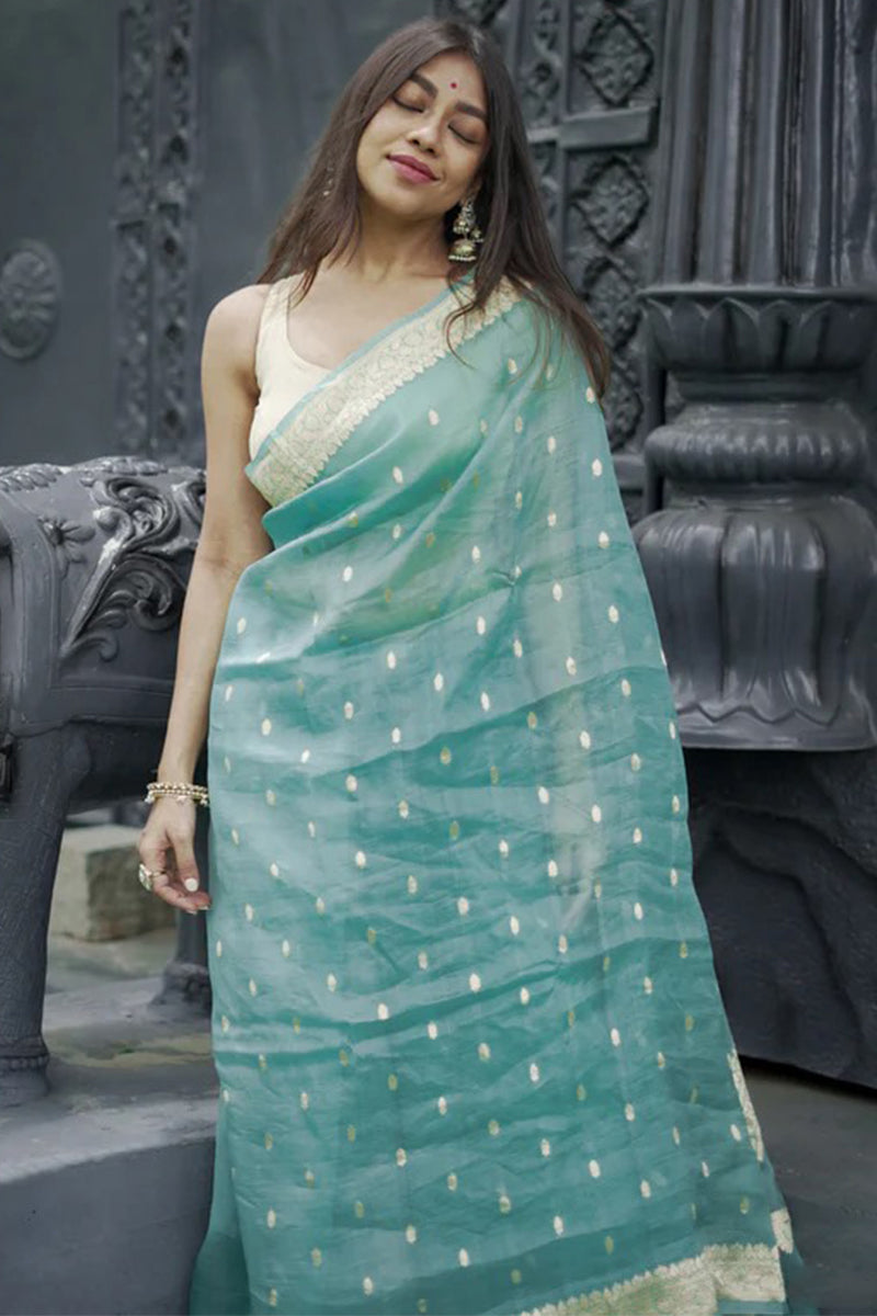 Luminous Turquoise Linen Silk Saree With Ravishing Blouse Piece