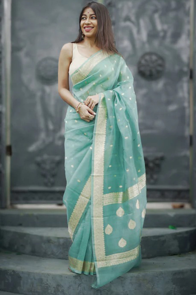 Luminous Turquoise Linen Silk Saree With Ravishing Blouse Piece