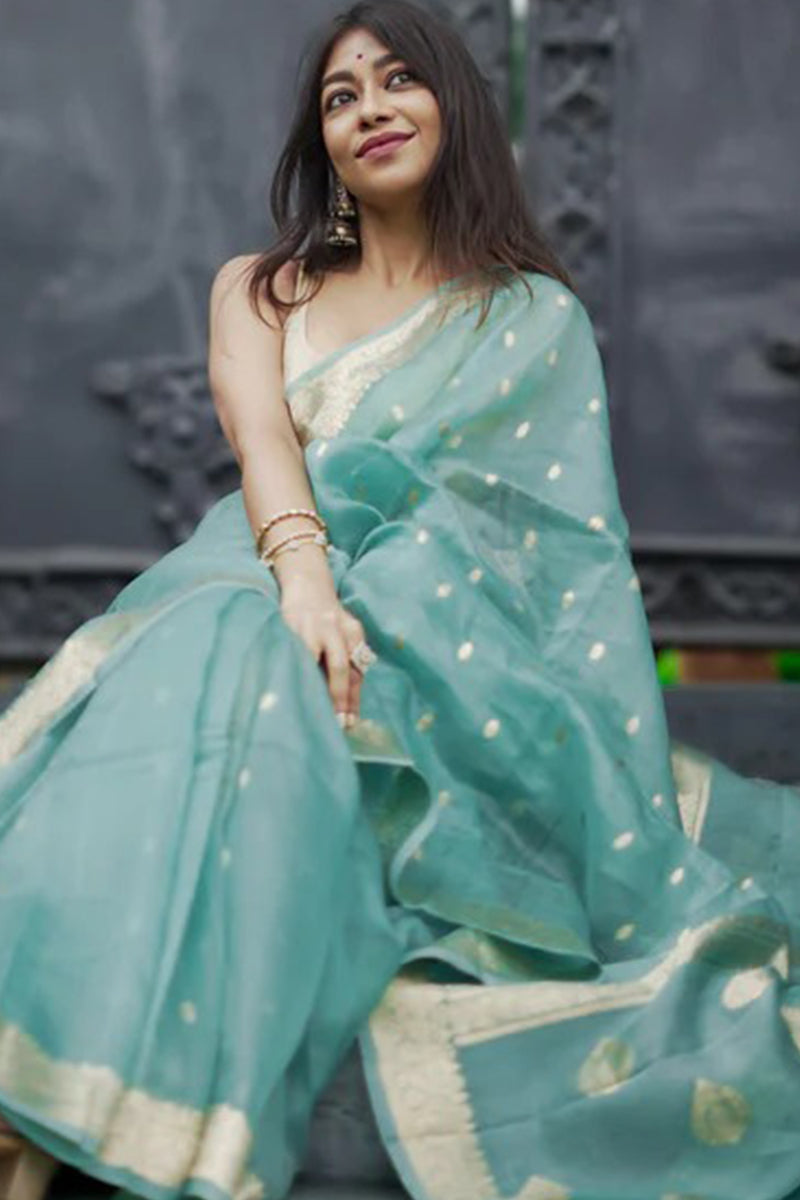 Luminous Turquoise Linen Silk Saree With Ravishing Blouse Piece