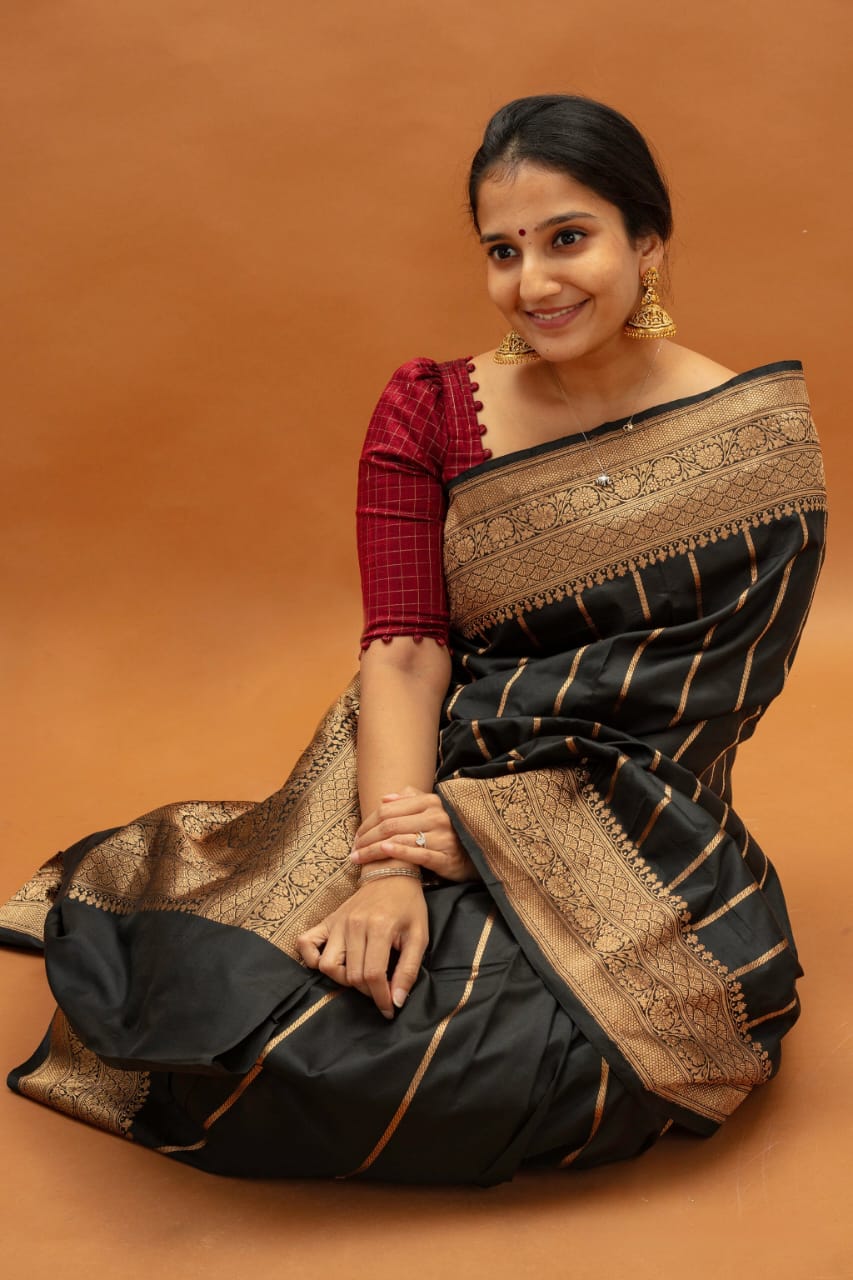 Inimitable Black Soft Silk Saree With Luminous Blouse Piece