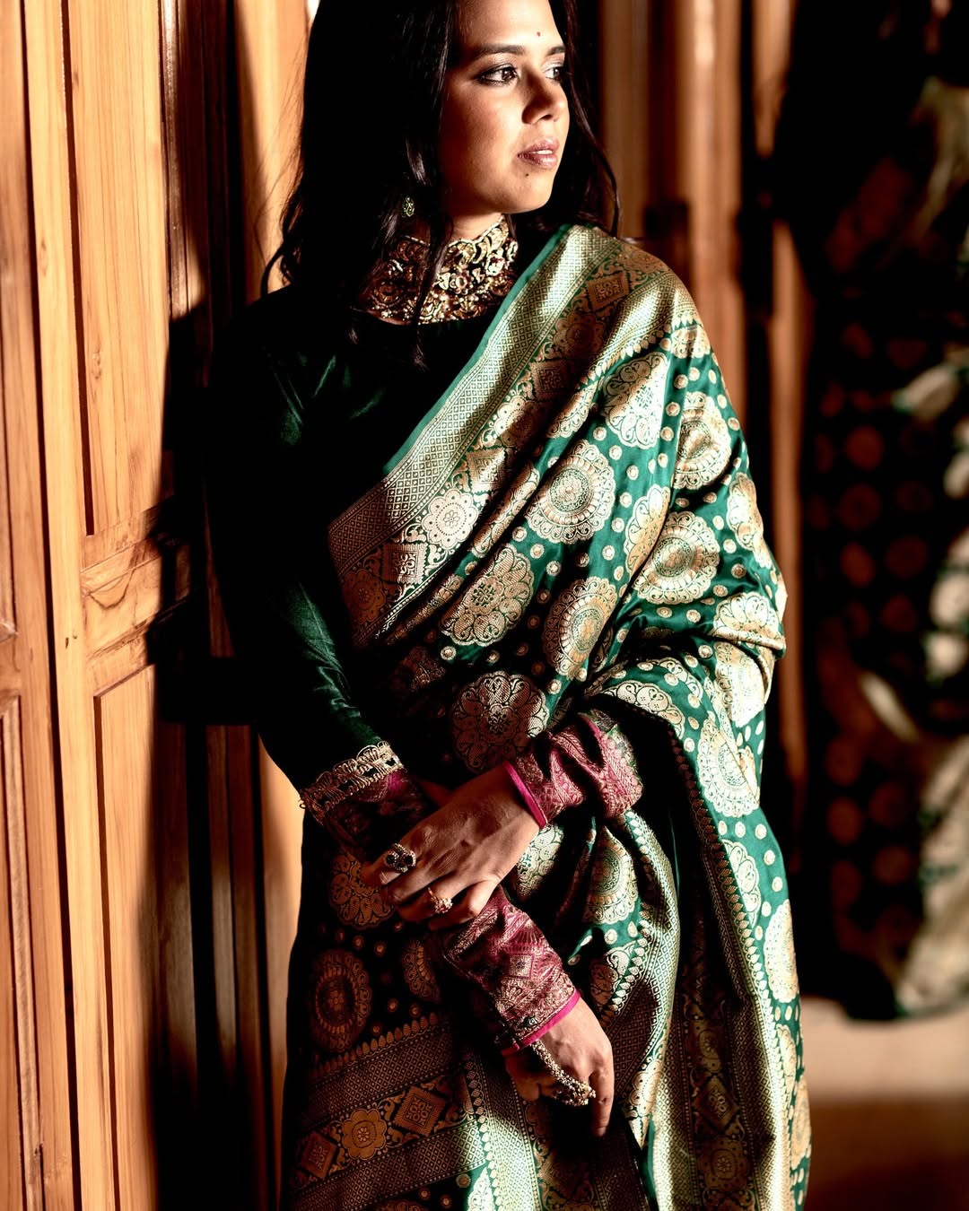 Beauteous Dark Green Soft Silk Saree With Demure Blouse Piece