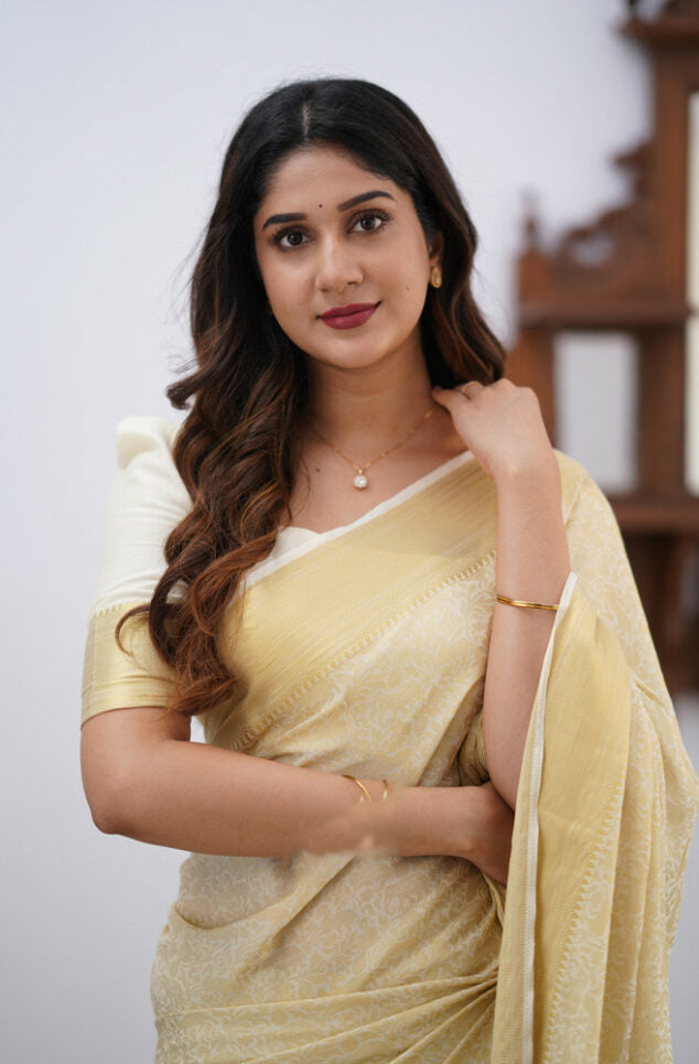 Winsome Beige Soft Silk Saree With Desultory Blouse Piece