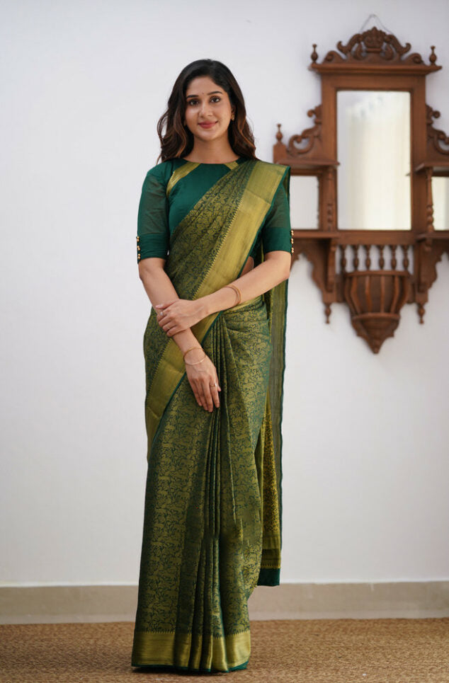 Desiring Dark Green Soft Silk Saree With Resonant Blouse Piece