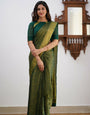 Desiring Dark Green Soft Silk Saree With Resonant Blouse Piece