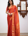 Pleasant Red Soft Silk Saree With Engrossing Blouse Piece