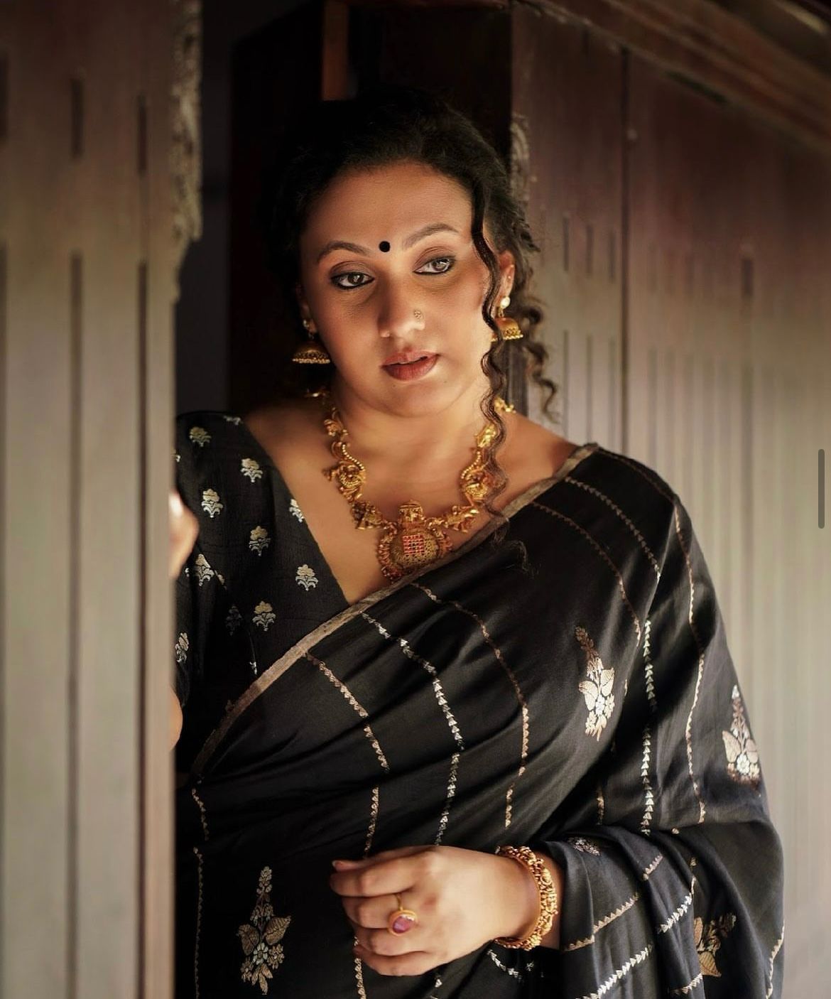 Fancifull Black Soft Silk Saree With Intricate Blouse Piece