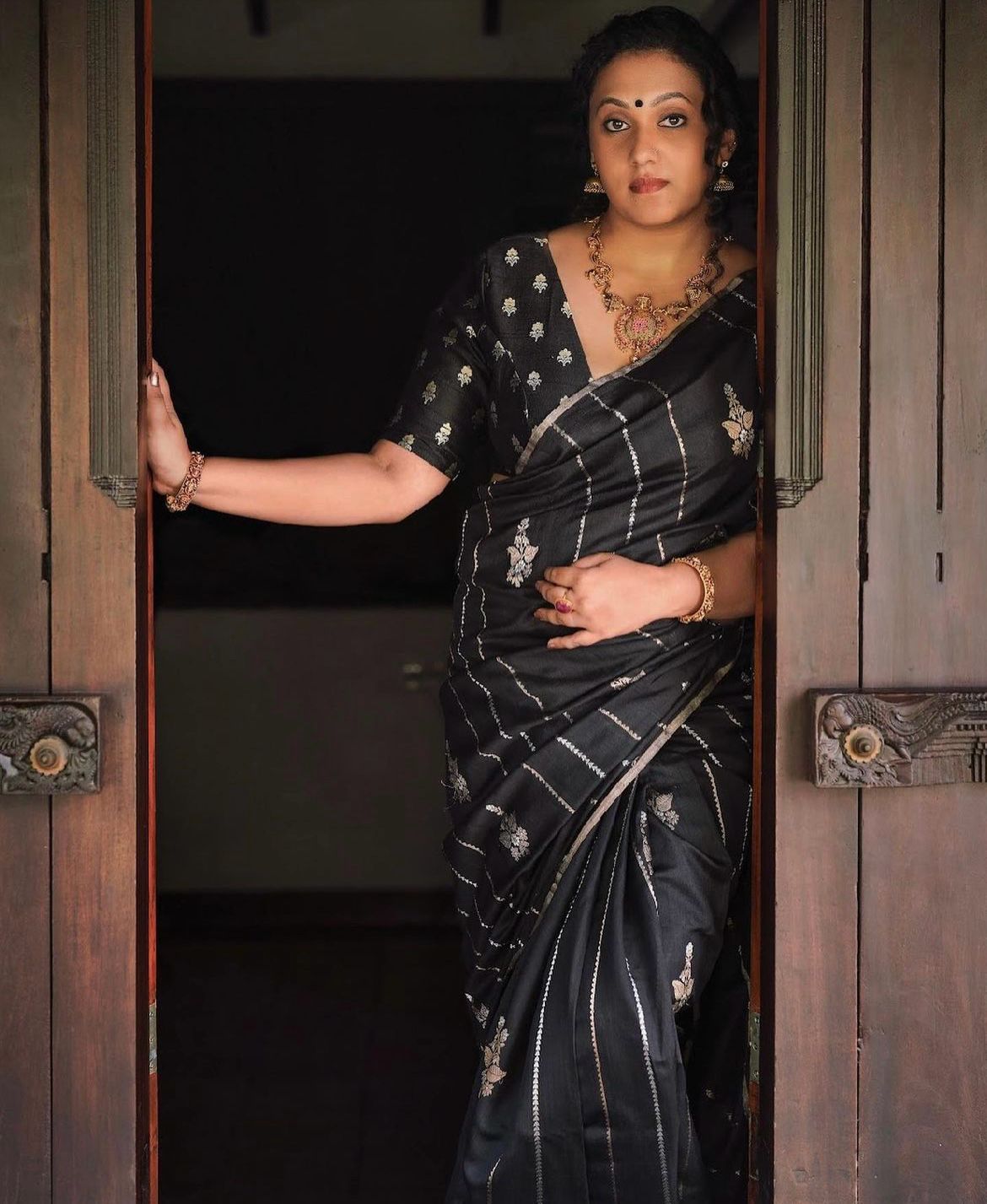 Fancifull Black Soft Silk Saree With Intricate Blouse Piece