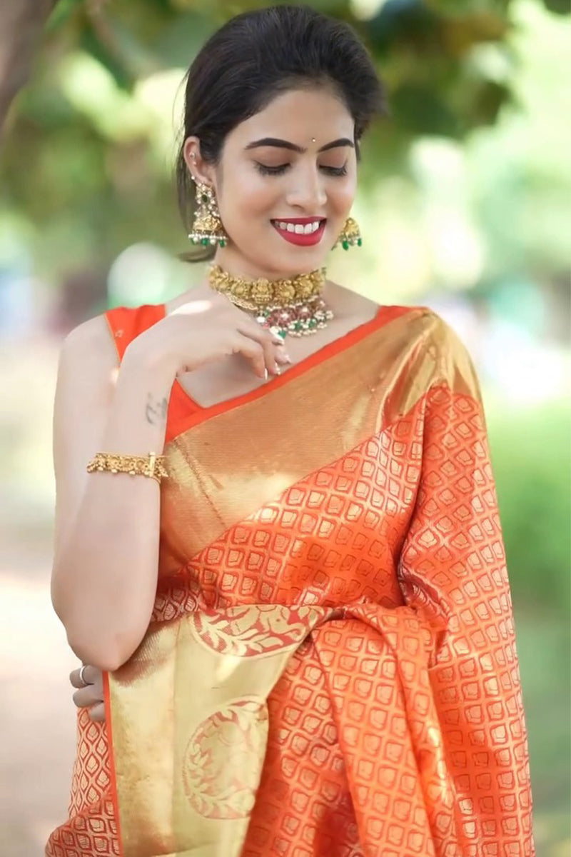 Girlish Orange Soft Silk Saree With Verdant Blouse Piece