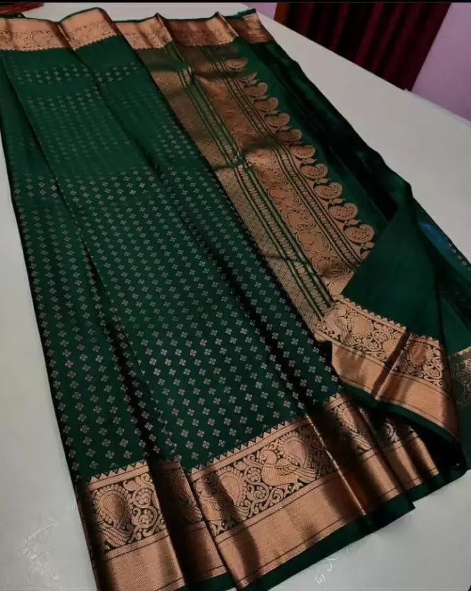 Amazing Dark Green Soft Silk Saree With Enchanting Blouse Piece