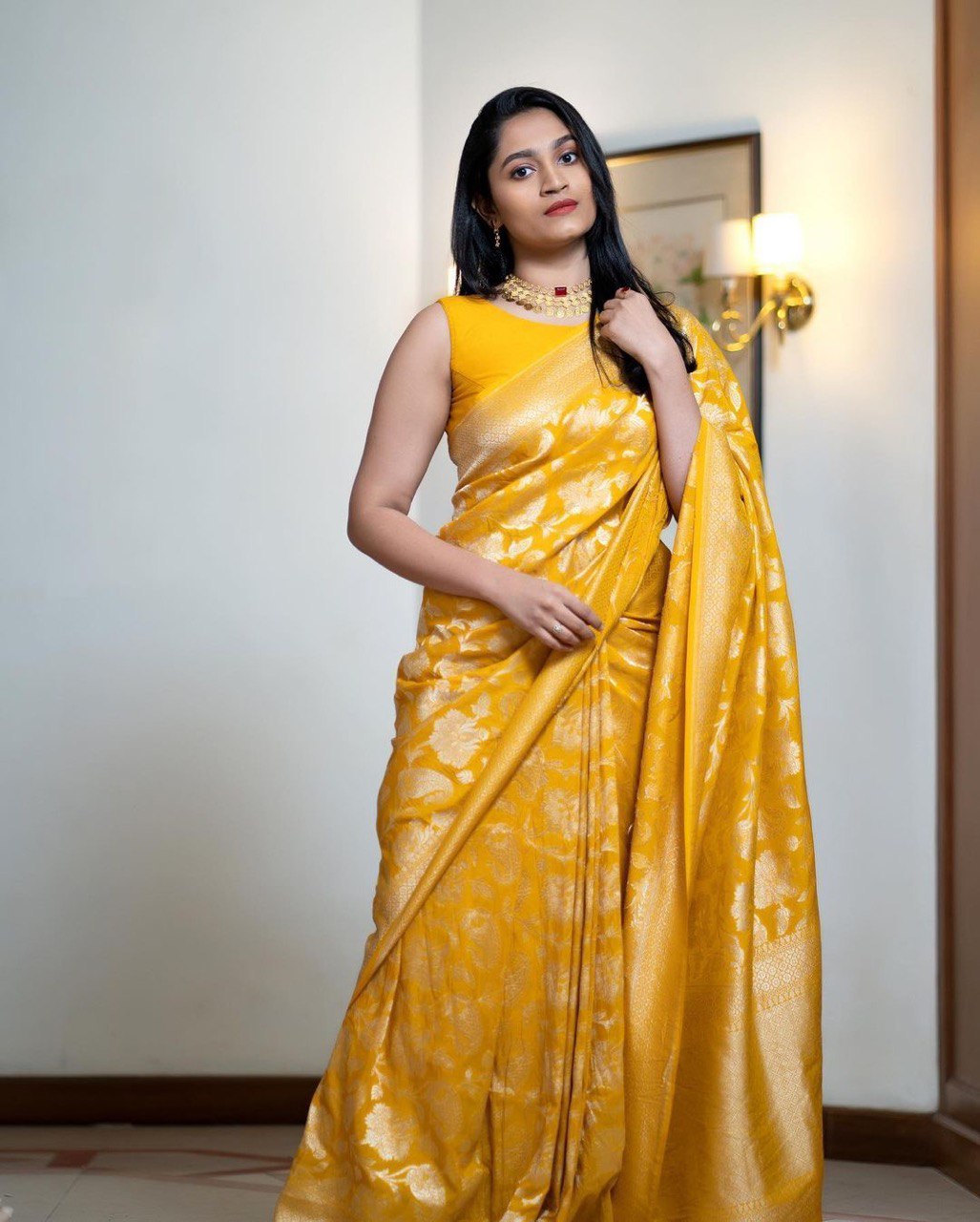 Impressive Yellow Soft Silk Saree With Pulsating Blouse Piece