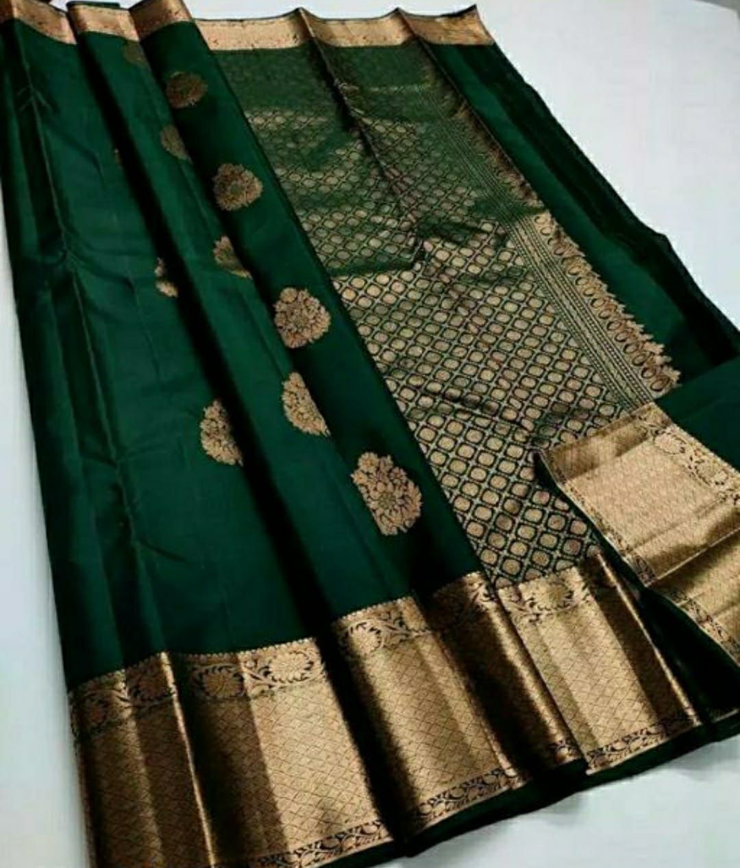 Excellent Dark Green Soft Silk Saree With Cynosure Blouse Piece