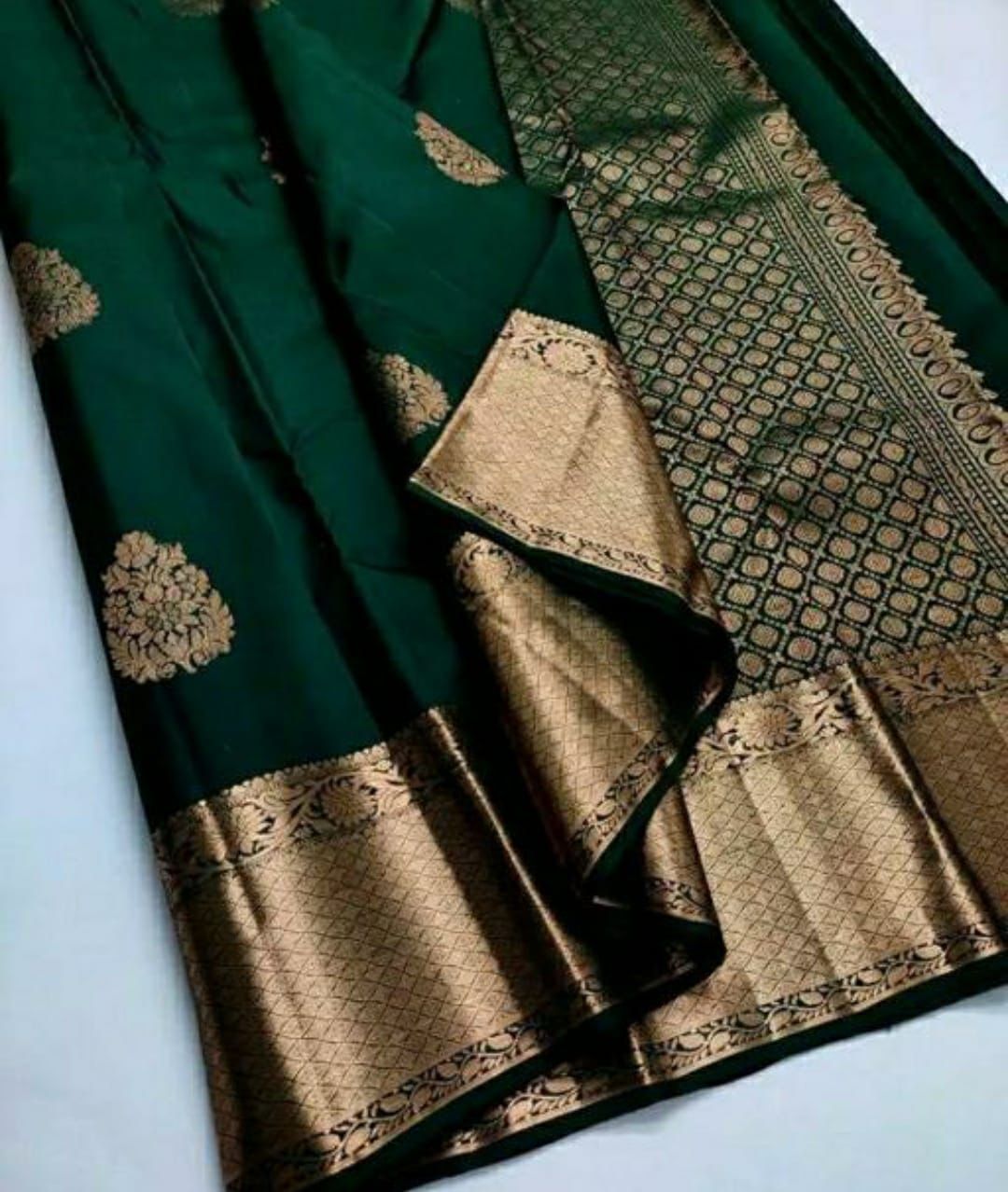 Excellent Dark Green Soft Silk Saree With Cynosure Blouse Piece