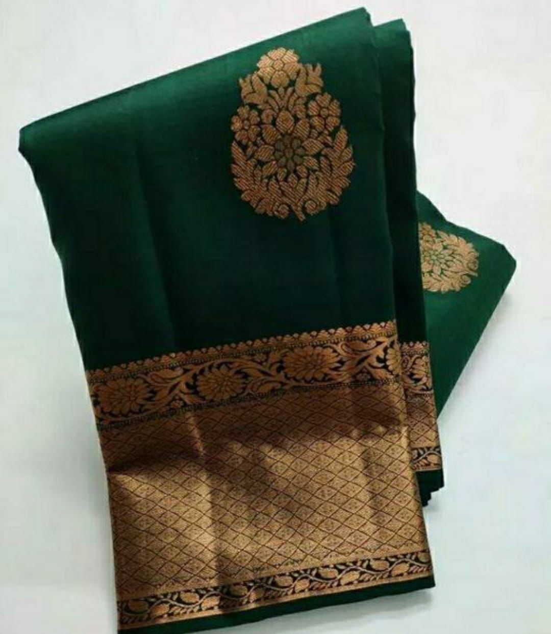 Excellent Dark Green Soft Silk Saree With Cynosure Blouse Piece