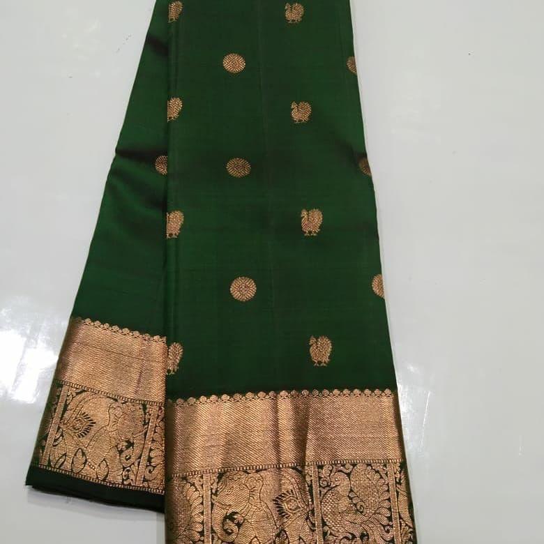 Extraordinary Dark Green Soft Silk Saree With Bewitching Blouse Piece