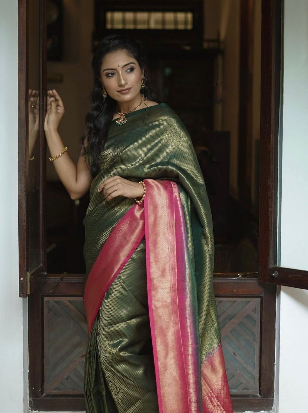 Bewitching Dark Green Soft Silk Saree With Designer Blouse Piece