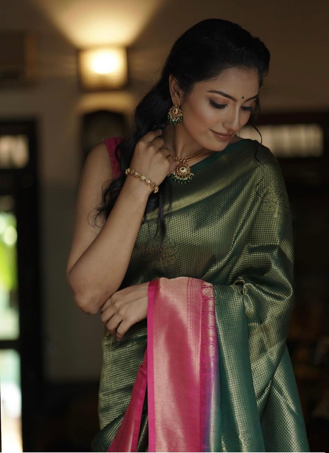 Bewitching Dark Green Soft Silk Saree With Designer Blouse Piece