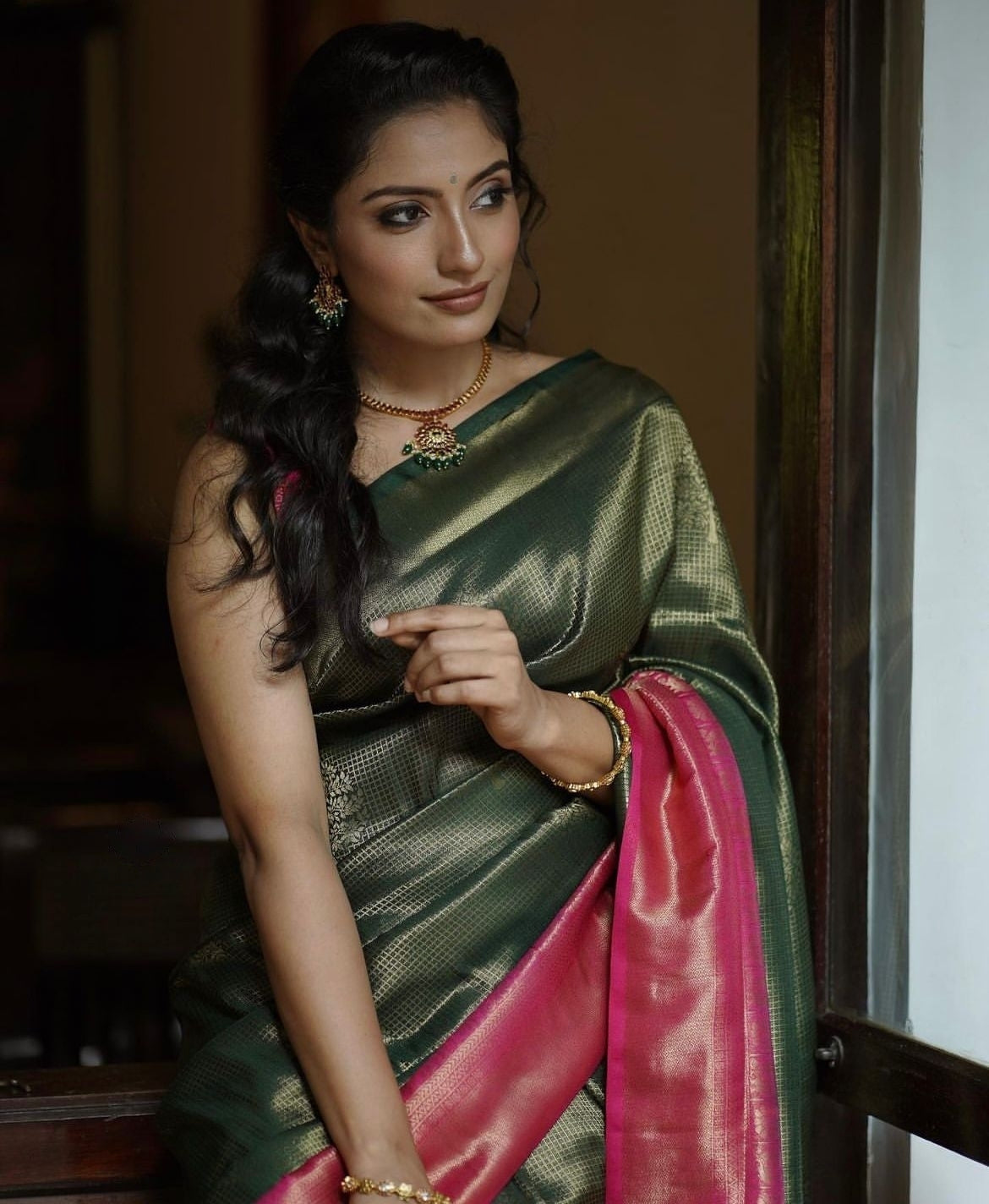 Bewitching Dark Green Soft Silk Saree With Designer Blouse Piece