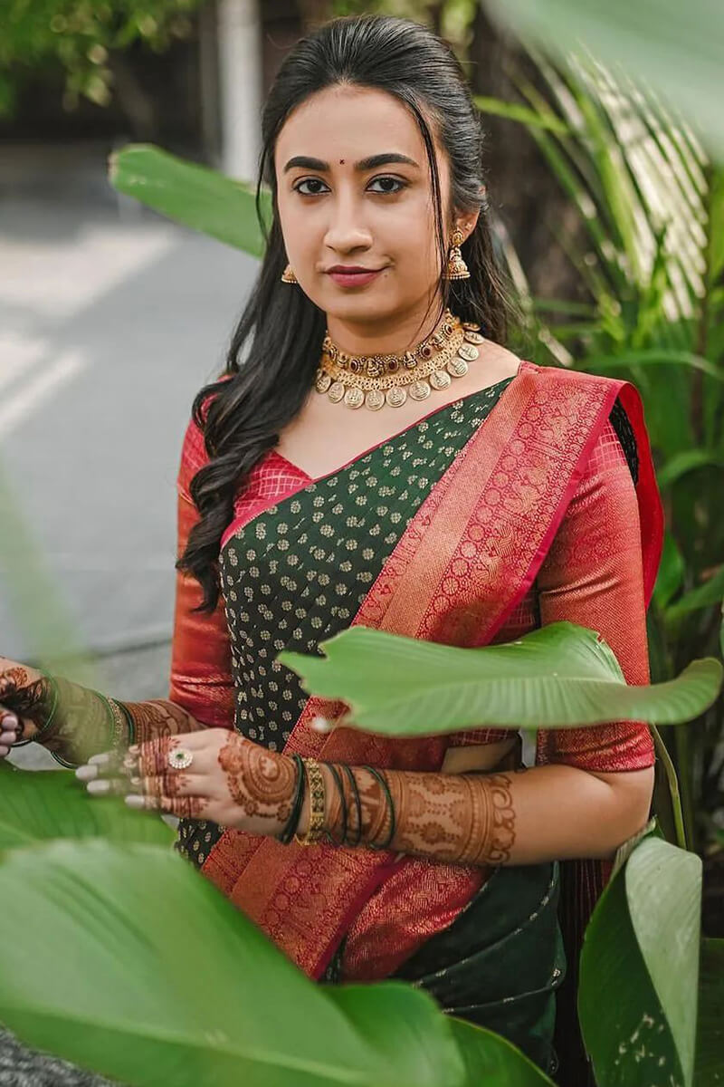 Elaborate Dark Green Soft Silk Saree With Artistic Blouse Piece