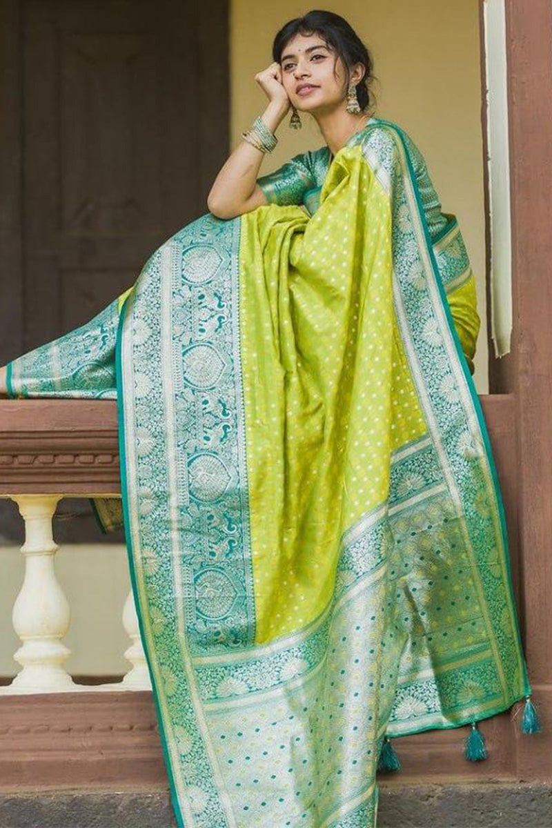 Effulgent Parrot Soft Silk Saree With Sonorous Blouse Piece