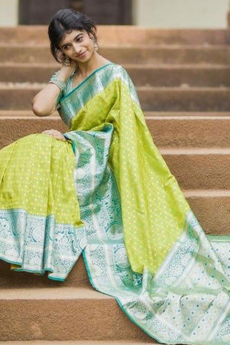 Effulgent Parrot Soft Silk Saree With Sonorous Blouse Piece