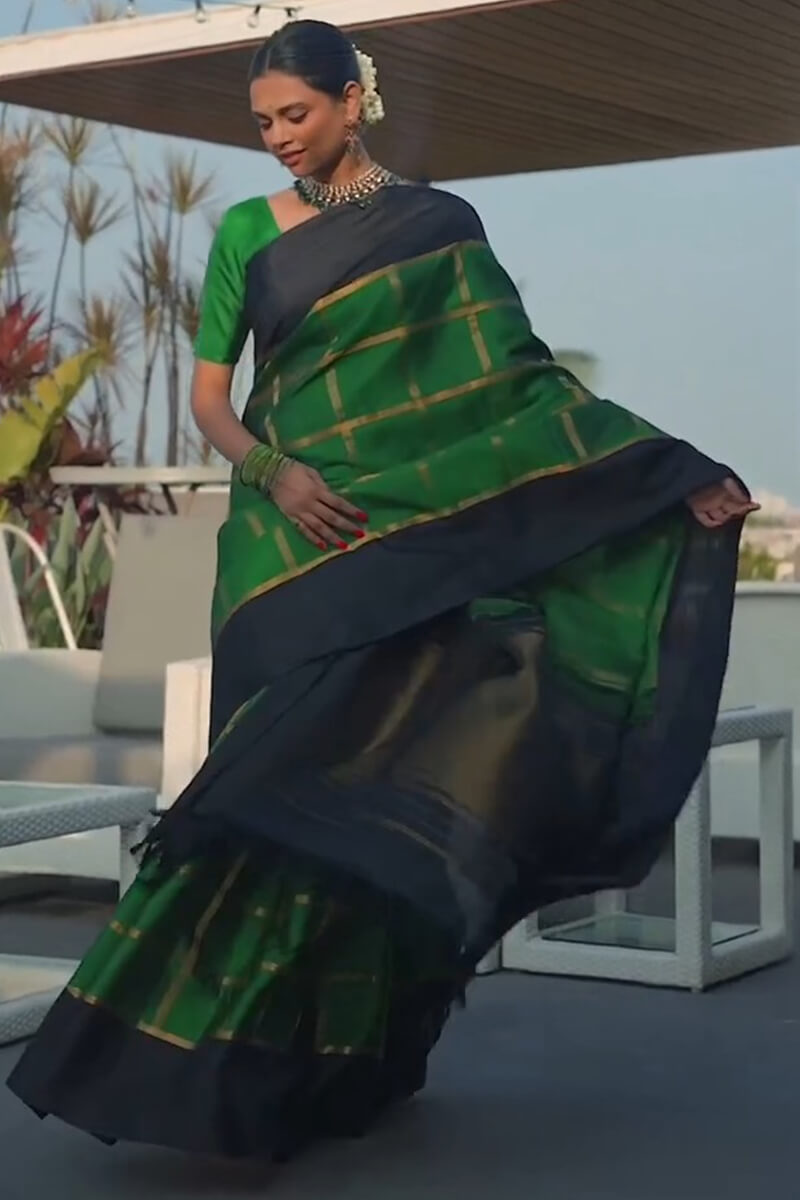 Twirling Dark Green Soft Silk Saree With Bucolic Blouse Piece