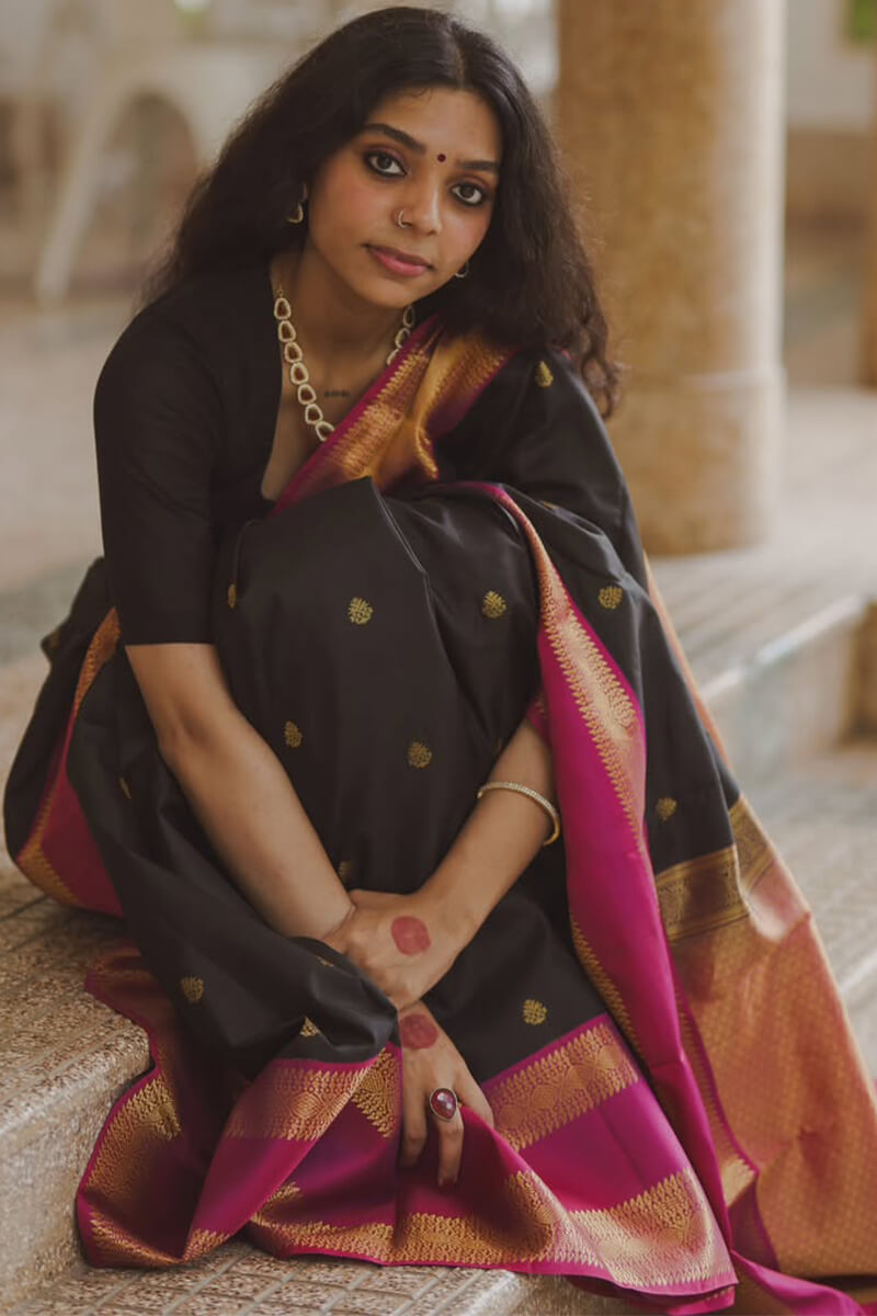 Enchanting Black Soft Silk Saree With Snazzy Blouse Piece