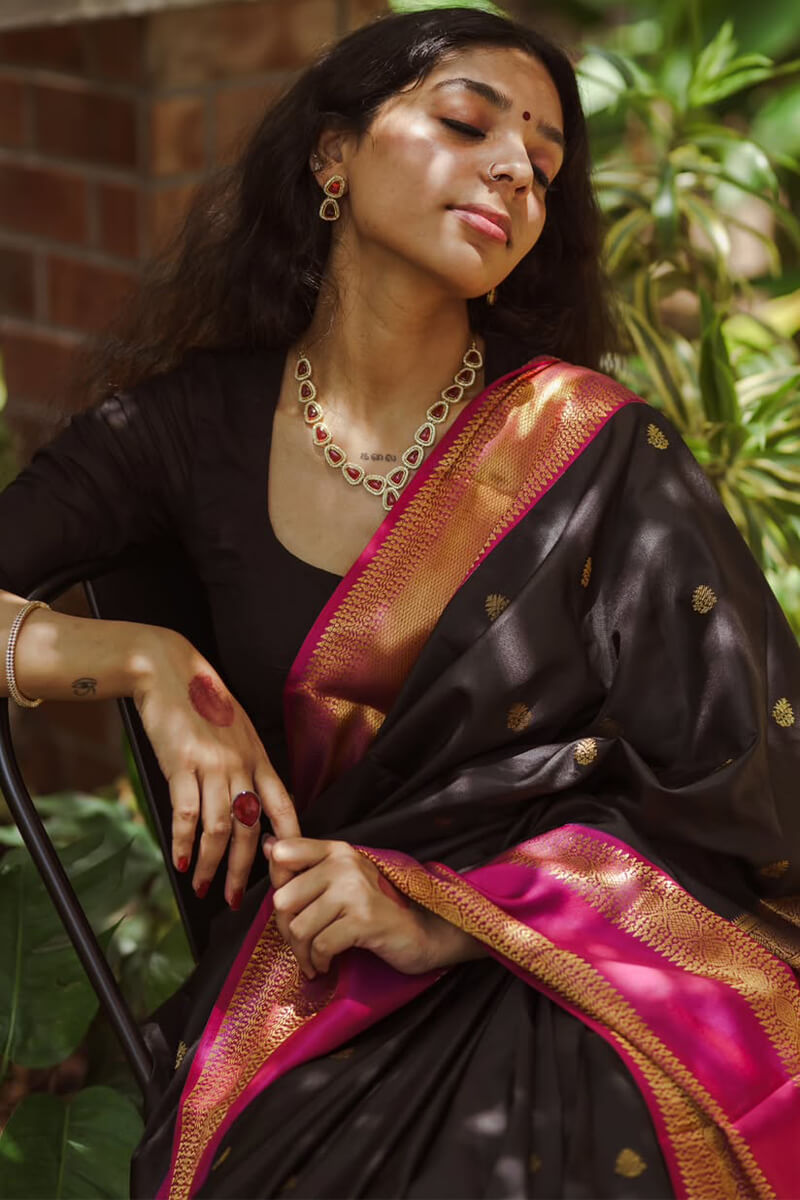 Enchanting Black Soft Silk Saree With Snazzy Blouse Piece