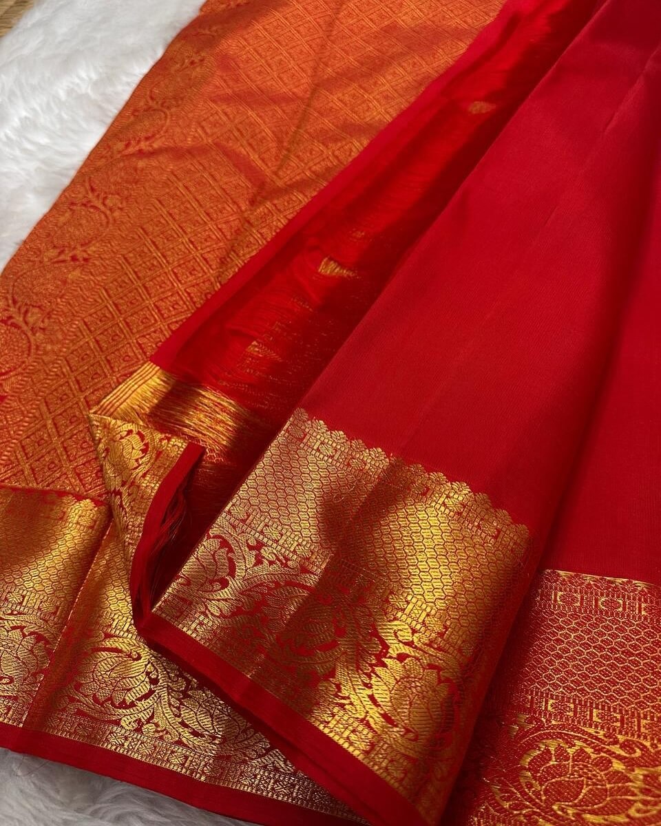 Transcendent Red Soft Banarasi Silk Saree With Profuse Blouse Piece