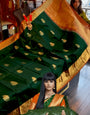Enigmatic Dark Green Soft Banarasi Silk Saree With Cynosure Blouse Piece