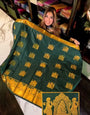Captivating Dark Green Soft Banarasi Silk Saree With Exceptional Blouse Piece