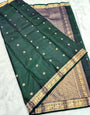 Deserving Dark Green Soft Silk Saree With Inimitable Blouse Piece